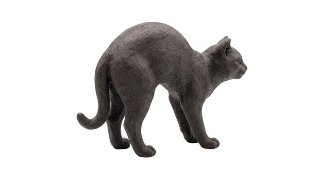 Dark ceramic cat sculpture with arched back and curled tail