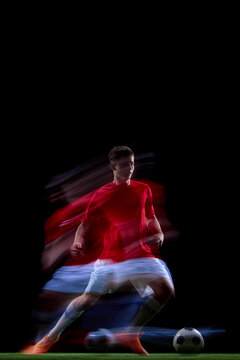 Sideways motion blur emphasizing rapid soccer acceleration. Concept of explosive movement, counterattack speed, athletic power and modern sports design.