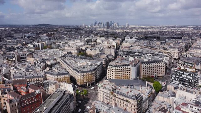 Aerial view of the historic architecture and dense urban landscape of Paris, Ile-de-France, France.