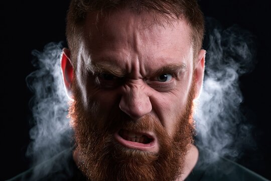 Furious Bearded Man Screaming in Extreme Rage with Steam Blowing Coming Out of His Ears Concept for Stress and Anger Management