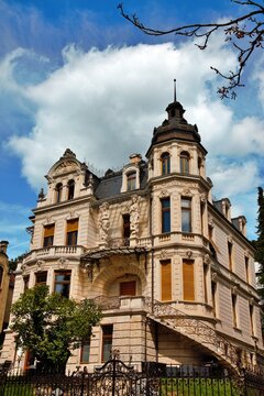 Wiesbaden, Hesse, Germany &ndash; Elegant historic villa with ornate facade, sculptural details, tower and decorative exterior staircase.