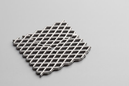 Lead acid battery grid fragment with diamond mesh pattern