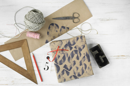 Printed packing paper, triangle, stamp, cord, packet