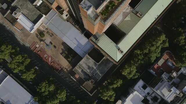 Aerial view of the Intendencia de Montevideo surrounded by urban streets, green trees, and city architecture in Montevideo, Departamento de Monte, Uruguay.