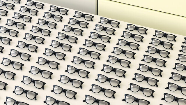 Rows of black glasses on a table
