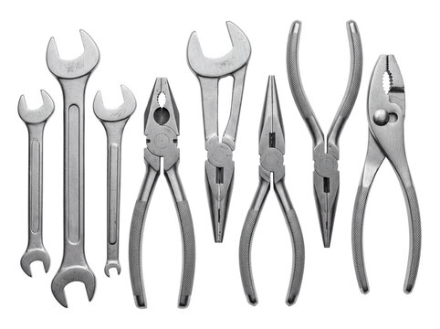 Hand tools wrench pliers set isolated on black background for repair mechanics construction work and DIY hardware equipment, professional steel spanner mechanical kit flat lay top view collection.