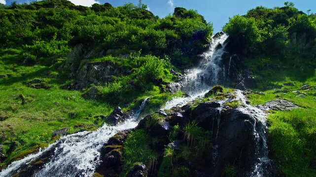 Panoramic Capra Waterfall Over Dark Alpine Rock