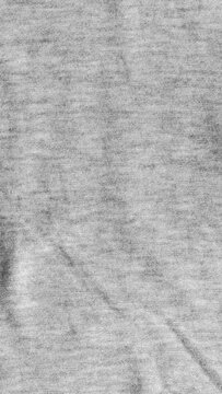 Heather gray jersey fabric texture, close up of soft cotton knit material background