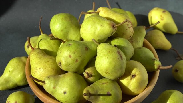 Pears Fruit Food Background. Yellow pear in wooden bowl