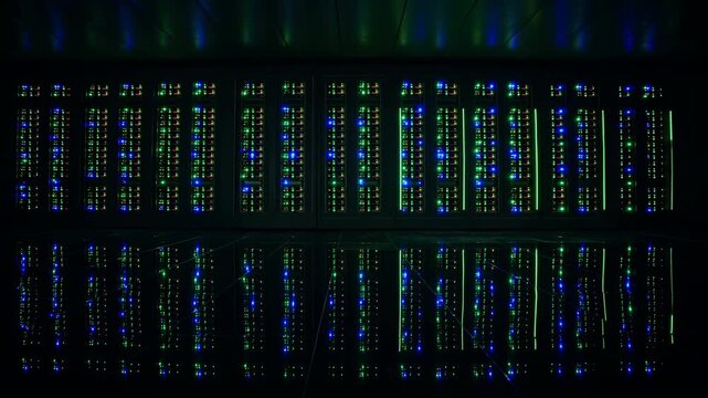 Server equipment panels glow with rows of blue, green and amber indicator lights in a dark interior, while subtle blinking patterns animate the symmetrical front-facing view