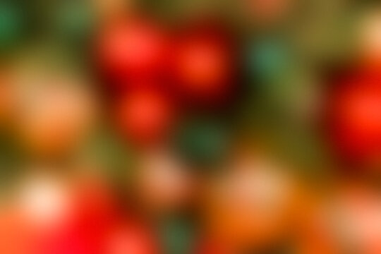 Fond bokeh de No&euml;l avec lumi&egrave;res floues rouge, orange et vert en arri&egrave;re-plan festif