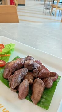 Suea Rong Hai Barbecue Cubed Beef Ribeye Tongue Steak served with sliced carrot and salad, Thai Food Cuisine, Grilled Sliced Meat Dish