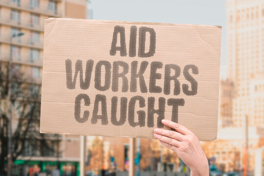 "Aid workers caught" Humanitarian personnel face danger during operations. HUMANITARIAN. SAFETY. AID. WORKER. RISK.
