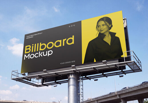 Advertising Billboard Mockup Against Blue Sky and Highway Background