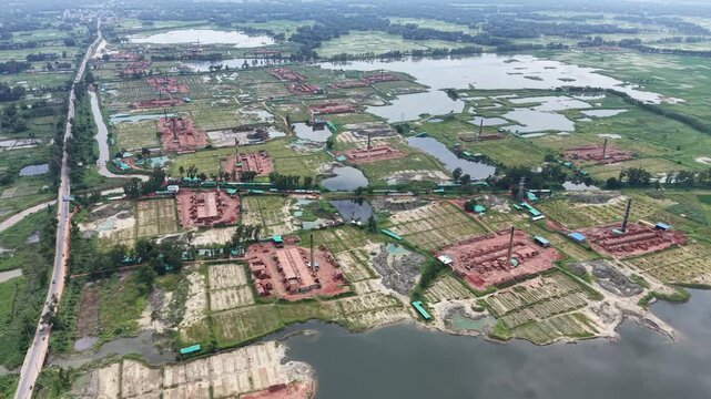 Aerial view of captures the extensive proliferation of brick kilns encroaching upon prime agricultural land at Satkania, along the Chittogram-Cox's Bazar highway in Bangladesh.