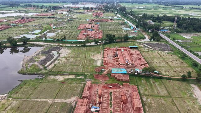 Aerial view of captures the extensive proliferation of brick kilns encroaching upon prime agricultural land at Satkania, along the Chittogram-Cox's Bazar highway in Bangladesh.