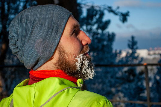 Endurance runner recovering after a long winter workout in freezing weather