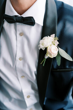 Close up of formal suit with boutonniere