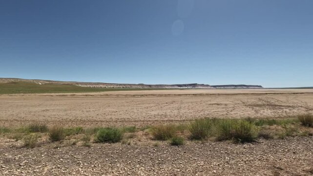Horizontal Pan Across Dry Desert Landscape