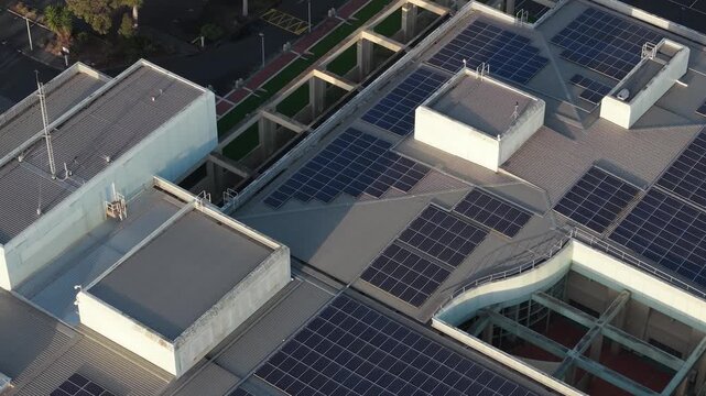 Melbourne, VIC, Australia - 03 September 2026: Aerial view of Knox Data Centre featuring extensive rooftop solar panel arrays under clear daylight.