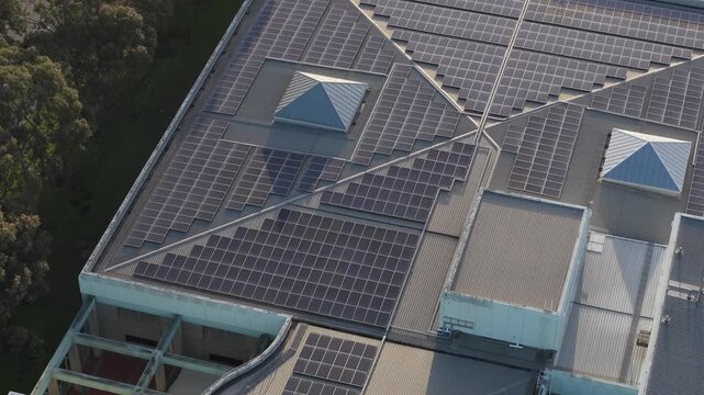 Melbourne, VIC, Australia - 03 September 2026: Aerial view of Knox Data Centre roof featuring extensive solar panel arrays and geometric skylights.