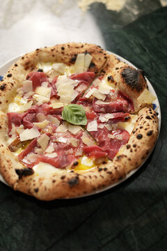 Neapolitan Pizza with Bresaola Mozzarella and Shaved Parmesan Close Up