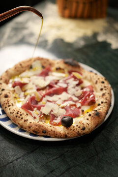 Neapolitan Pizza with Bresaola Mozzarella and Shaved Parmesan Close Up