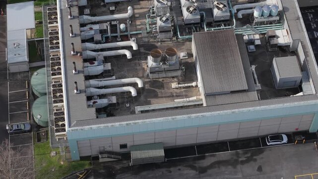 Melbourne, Australia - 03 September 2026: Aerial view of Knox Data Centre featuring industrial rooftop cooling units, ventilation systems, and surrounding parking areas.