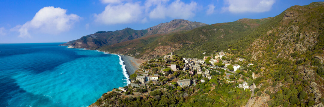 Nonza Cap Corse authentic villgae in Corsica France aerial drone panorama perched cliff town black pebble beach Genoese tower turquoise sea coast landscape high resolution world print