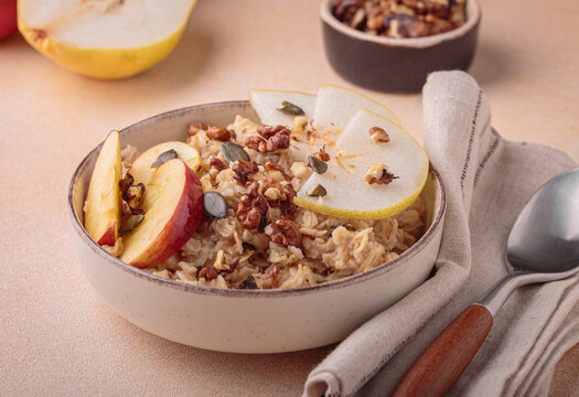 Autumn oats porridge breakfast fresh fruits nuts pear apple