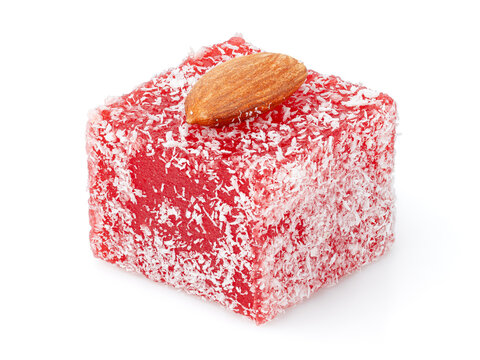 Assorted Turkish delight sweets pattern background. Colorful Rahat lokum with nuts and coconut flakes close up. Dessert	
