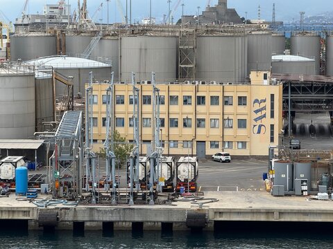 26 April 2026, Italy, Liguria, Genoa, Port Terminal Contenitori, SFI - SAAR building coastal storage and loading arms area refinery by Nisshin Oillio group for vegetable palm oils
