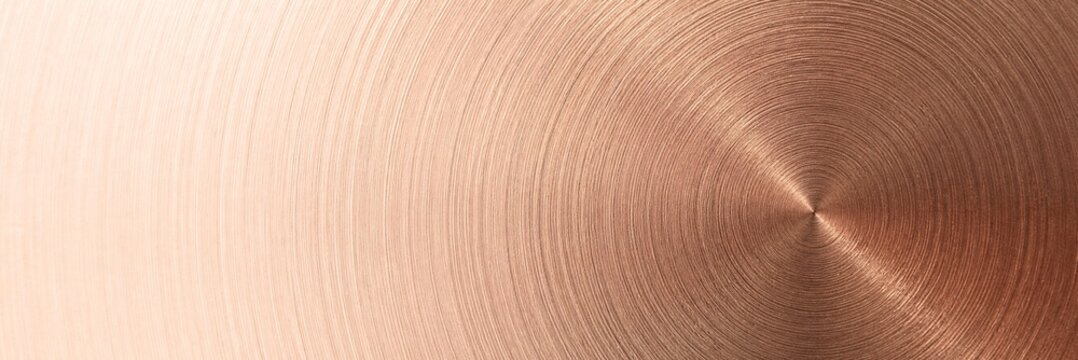 Brushed copper metal texture, circular rose gold metallic background, industrial bronze surface with radial light reflections
