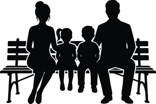 Silhouette of a happy family with parents and two children sitting together on a park bench