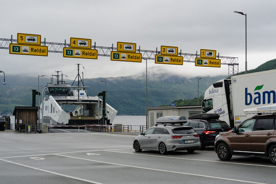 August 16, 2026, S&aelig;b&oslash;, Norway - Cars and a Bama truck waiting to board the Hydra ferry at a terminal