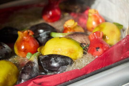 Assortment of colorful marzipan fruits, a Sicilian delicacy in Taormina.