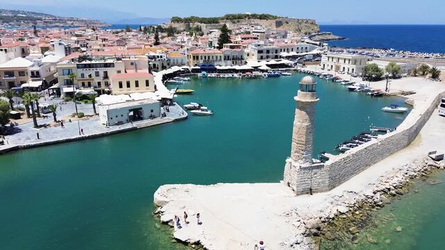 harbor and lighthouse of Rethymno old town, Crete, Greece, retro toned