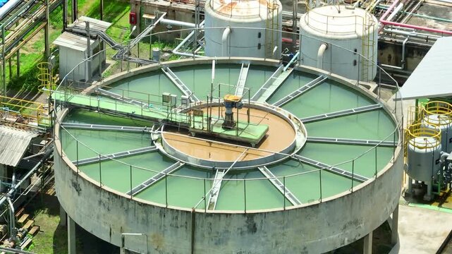 Drone view shows an industrial sedimentation and clarification tank, symbolizing wastewater treatment, cleaner production, pollution control, water conservation and environmental responsibility.
