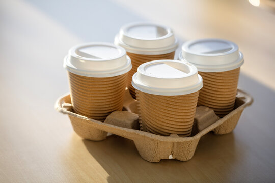 Coffee take out disposable cups on desk in office ready for meeting