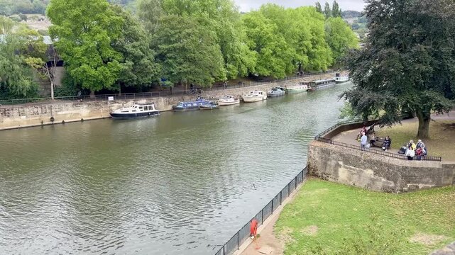 Moored Boats and Green Trees Along the River in Bath
