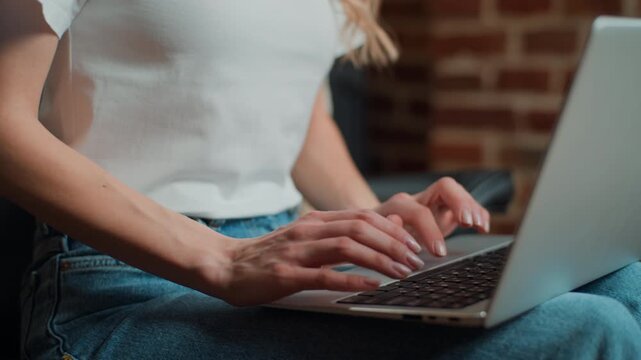 Close up focused Caucasian woman typing laptop device with remote work business job in office female busy with digital productivity with computer businesswoman with internet task chatting in company