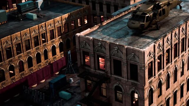 In a vibrant cityscape, a helicopter is perched on the roof of an old brick building, while shadows dance across the streets below. The moment captures a blend of urban life and dramatic action.