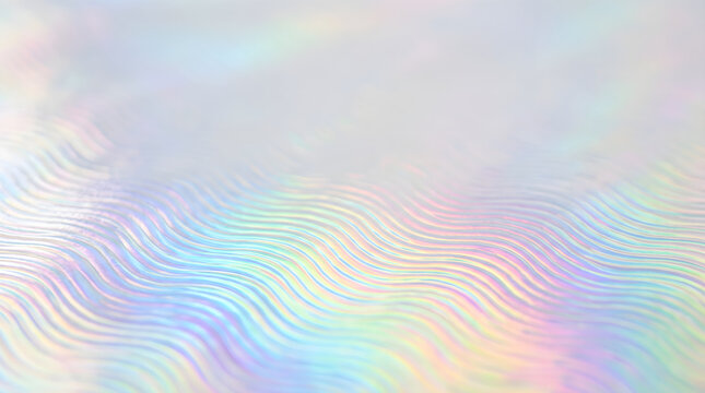 Close-up of iridescent holographic foil wave texture background