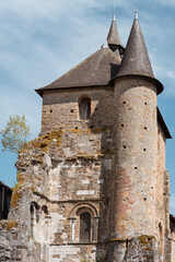 Medieval stone turret rising in quiet Romanesque harmony beneath soft daylight © ADEQUARL