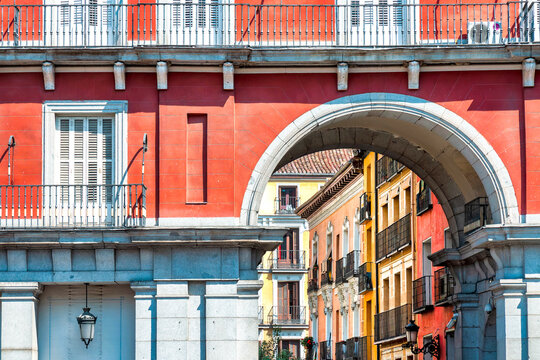 Plaza Mayor Madrid Arch With Colorful Balconies And Stone Facade