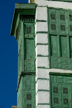 Wooden mashrabiya balconies on a historic building corner, Mecca province, Jeddah, Saudi Arabia