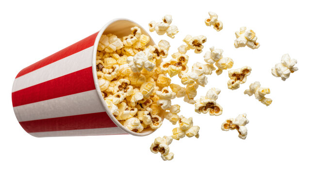 Red and white striped popcorn bucket spilling kernels, isolated on transparent background