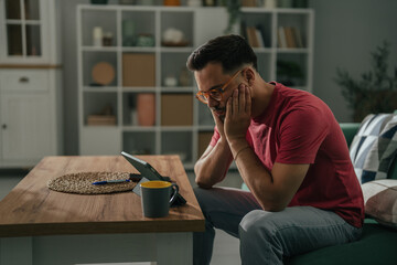 Frustrated man feeling burnout and stress working from home
