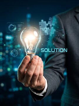 Advanced technology solution visualization featuring luminous light bulb and floating digital puzzle elements