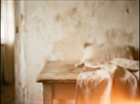 Vintage film grain texture with soft light in a rustic bedroom interior background.